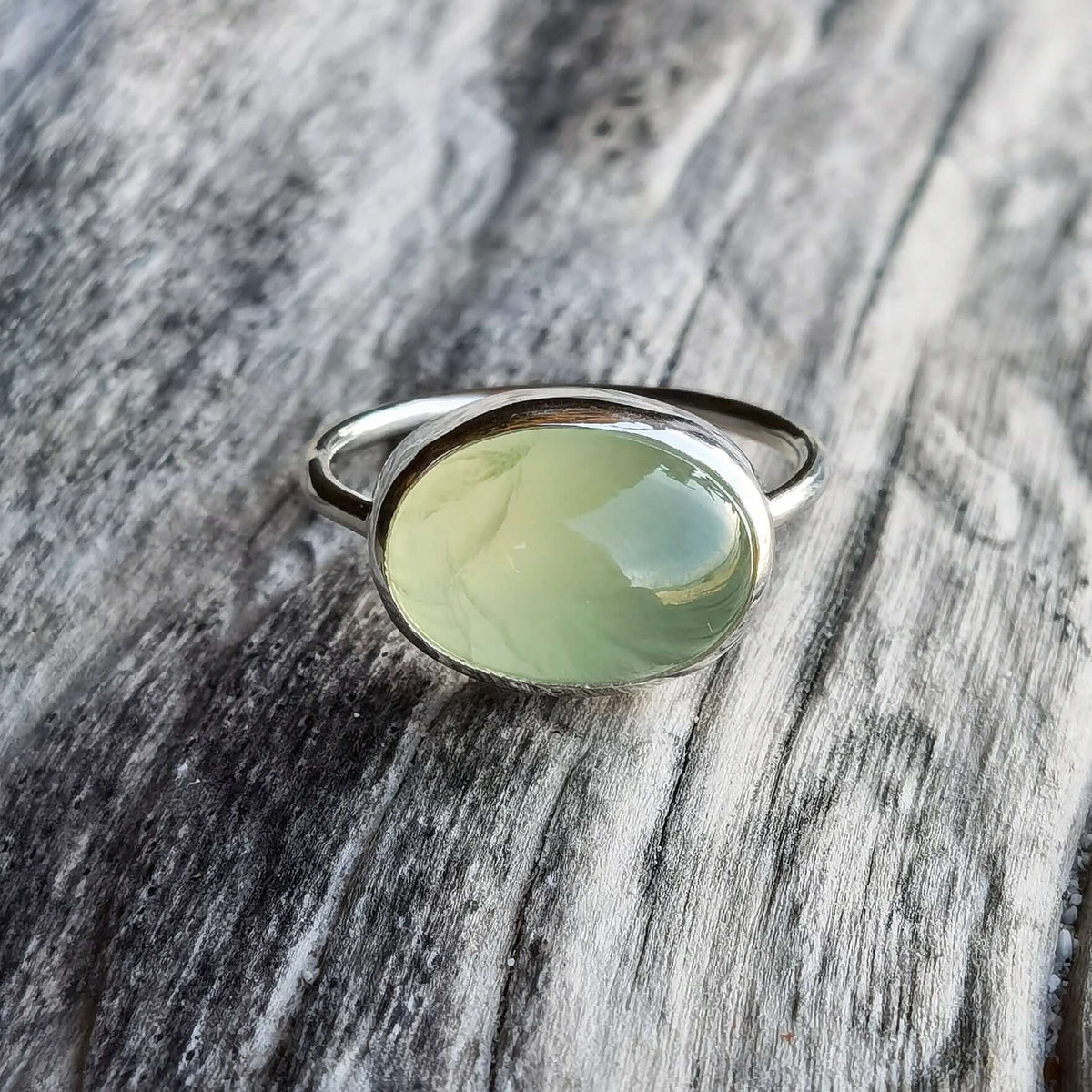 Prehnite oval ring set in 925 silver