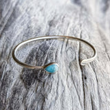 Handmade silver cuff with larimar drop