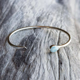 Handmade silver cuff with larimar drop