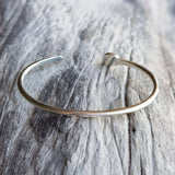 Handmade silver cuff with larimar drop