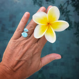 Spiral ring Larimar 925 silver worn in a woman hand
