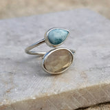 Larimar and citrine spiral ring, close-up product view.